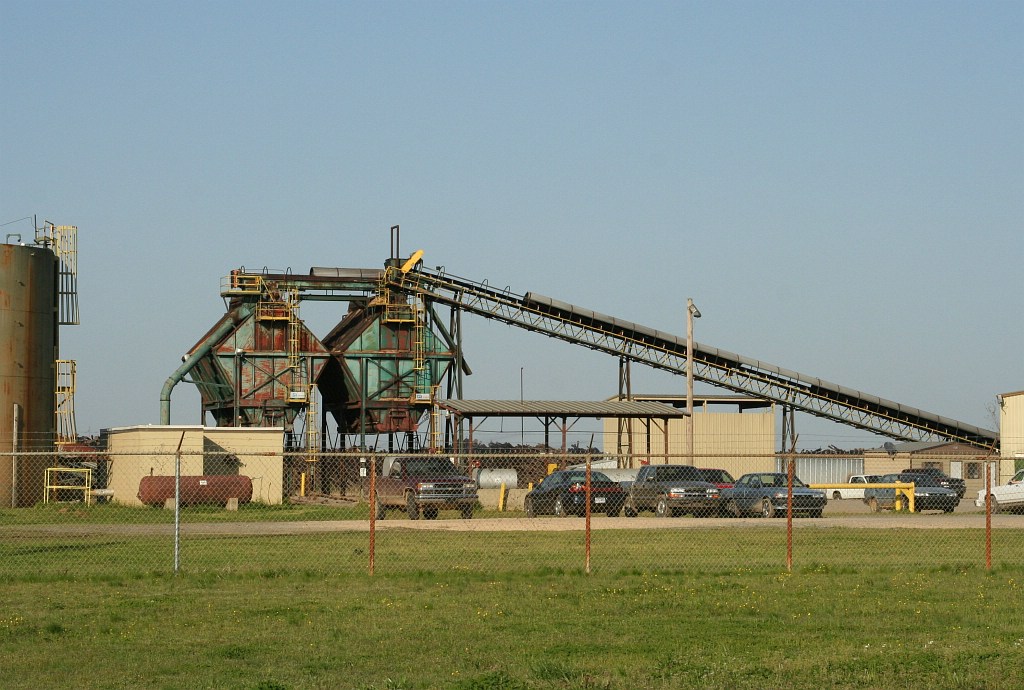 Woodchip truck loader at lumber plant